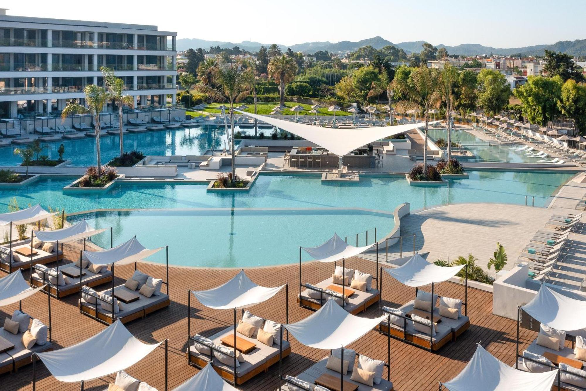 Electra Palace Rhodes Ялисос Екстериор снимка The resort's lagoon